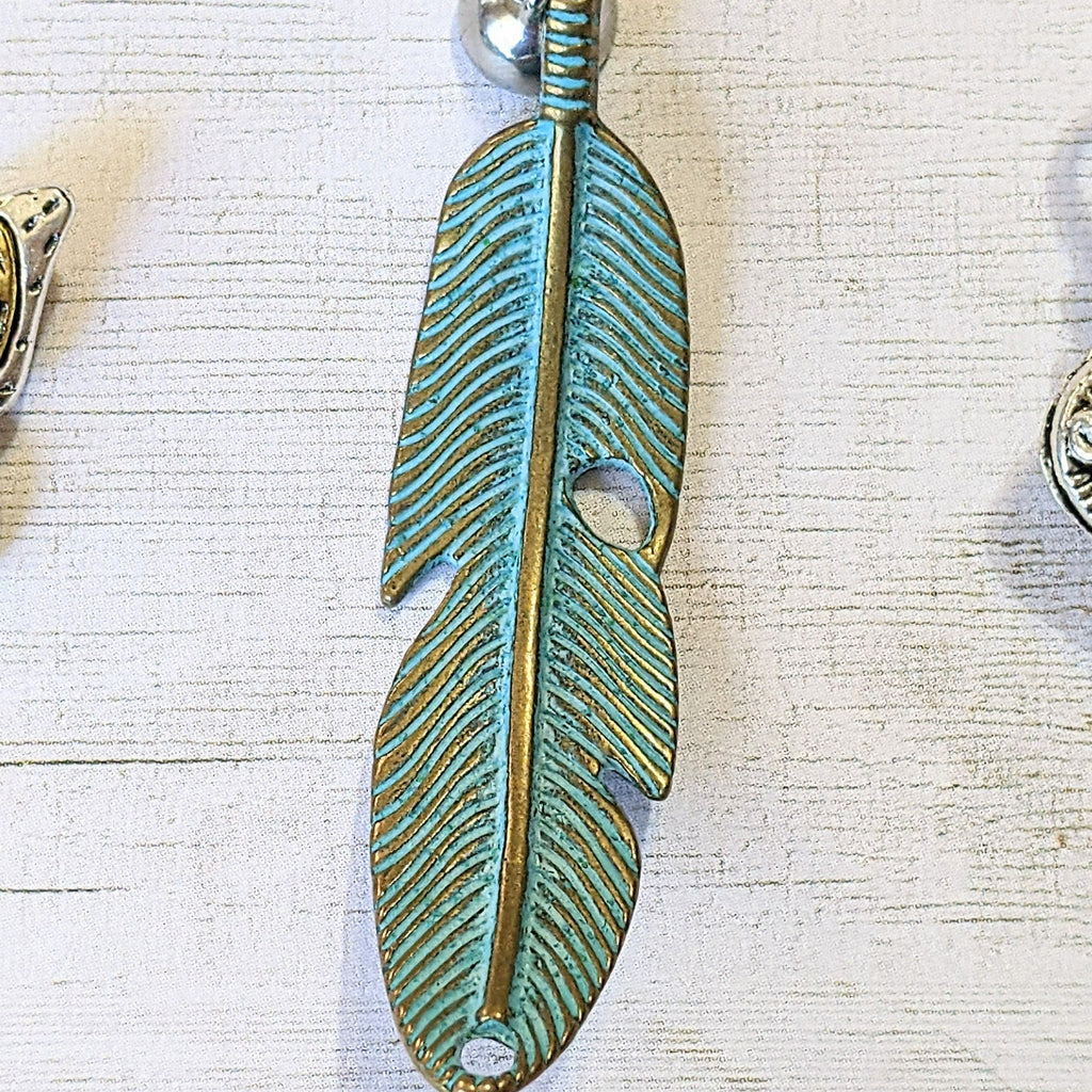 Blue Patina Curved Feather Pendant