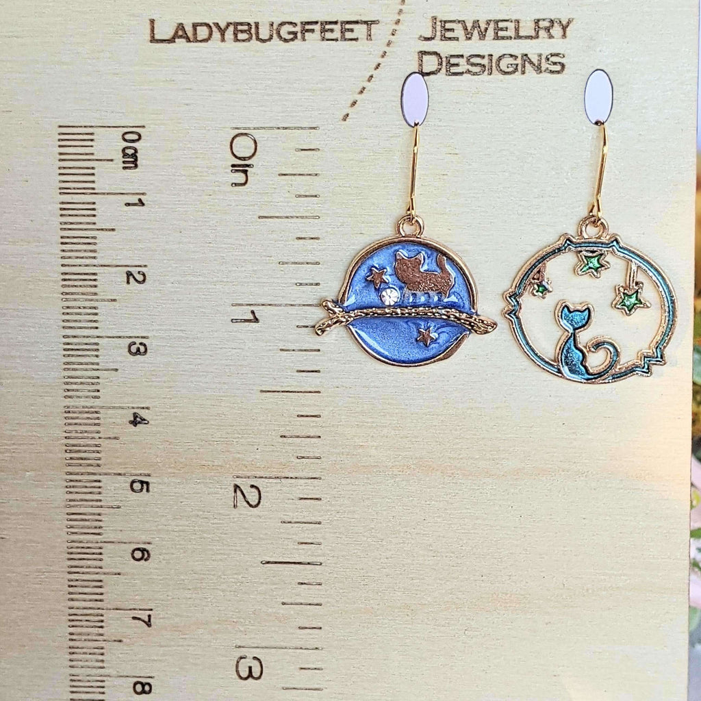 Mismatched Blue Cat and Star dangle earrings