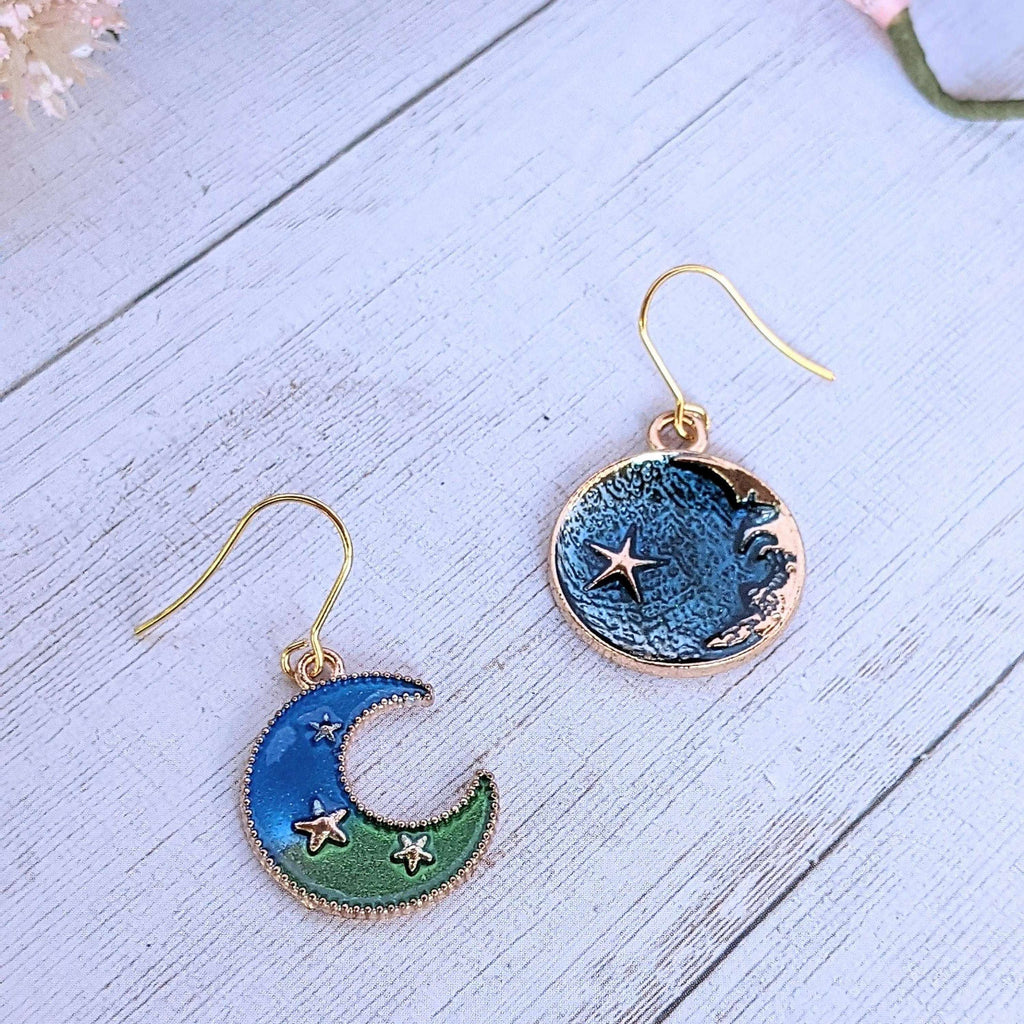 Mismatched Blue Crescent Moon and Earth dangle earrings
