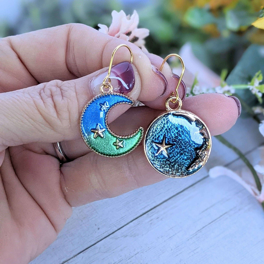Mismatched Blue Crescent Moon and Earth dangle earrings