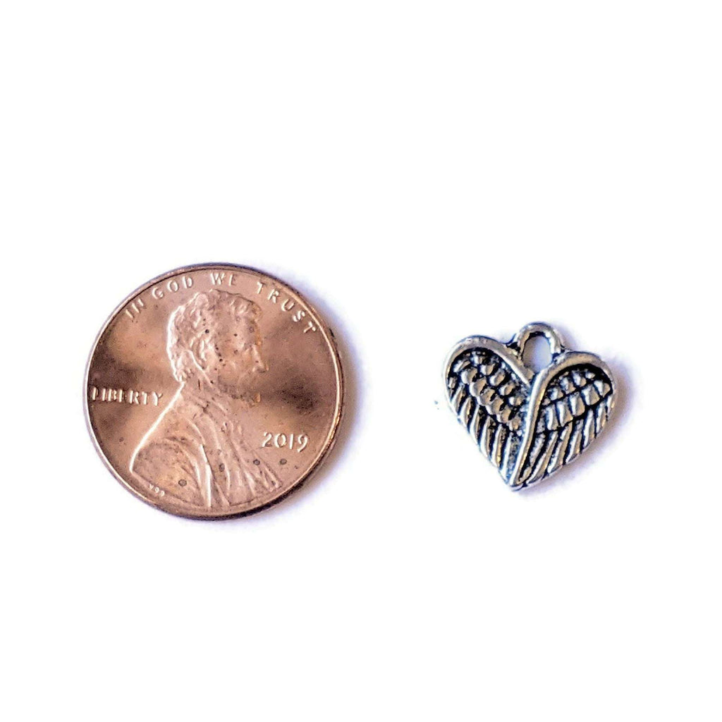 Tiny Silver Winged Heart Charm